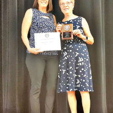 Congresswoman McSally presents a certificate to Colonel Peggy McGee who is holding the award plaque; photo by John McGee.
