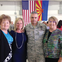 From left: TWOQC baby shower Chair Pam Rodgers, Mrs. Roslyn MacDonald, Brigadier General MacDonald and TWOQC President Carol Mutter
