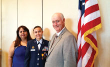 Cadet Major Ana Fajardo, Air Force JROTC, is flanked by her mother Sonia Corrazco and Lieutenant Colonel Don Belche, JROTC Advisor at Nogales Hugh School; photo by Betty Atwater.