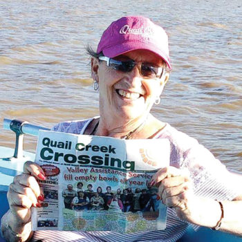Joyce Shumate relaxed at Lake Chapala, Mexico (the largest lake) along with her copy of the Crossing.