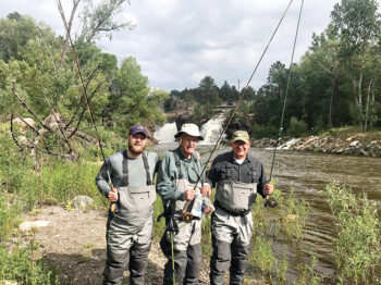 Rocky Mountain High fly fishing for Andy Bandstra along with son and grandson over Father's Day weekend found them reading the Crossing.