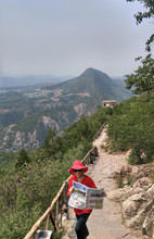 Laura Reilly traversing (hanging on!) the Yanshan mountain in China.