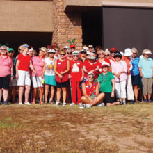 The majority of the Putters wore holiday colors on Christmas in July day. Photo by Sylvia Butler.