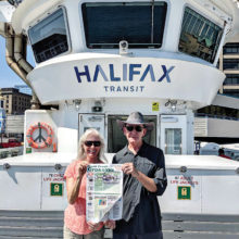 Judy and George Mynatt read their Crossing copy while tripping through the maritime provinces of Canada.