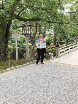 Kenrokuen Garden in Japan found Linda Armijo enjoying her copy of the Crossing.