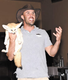 Jed Dodds holding a fox.