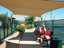 Residents enjoying the new sun shade.
