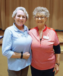 Lydia Lukins (left), shown with Sharon Schoen, was the last Lady Putter to receive the Coveted Quail before the putting green was closed in March. (Photo by Sylvia Butler)
