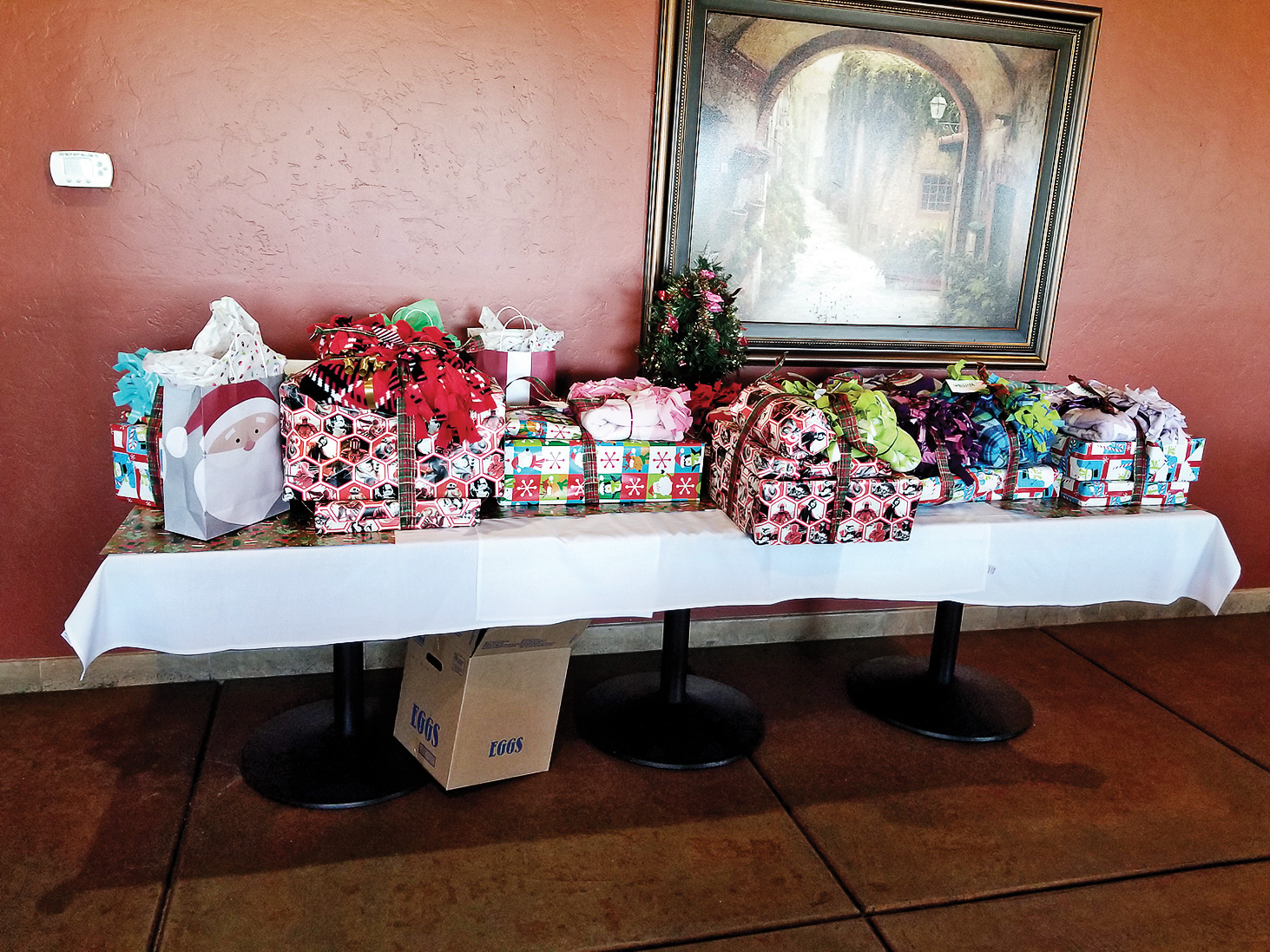 Children and moms received several gifts from MOAA. The rest of the gifts were in the car—too many to carry! (Photo by Betty Atwater)