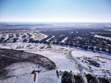 Minus 12 degrees and 40 knot gusts; photo taken on the fly as the drone passed overhead. Pond frozen and snow-covered.